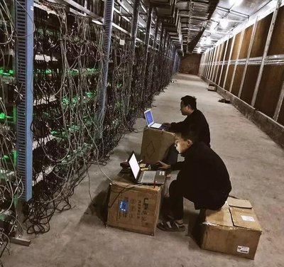 State-of-the-art mining farm showcasing rows of mining rigs cooling under optimized conditions