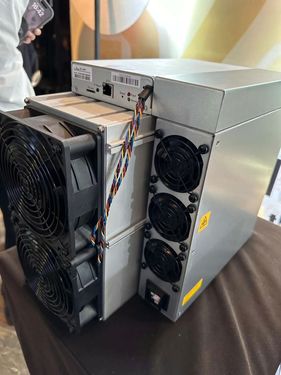 ASIC mining rigs in HydroMine's liquid-cooled hosting facility